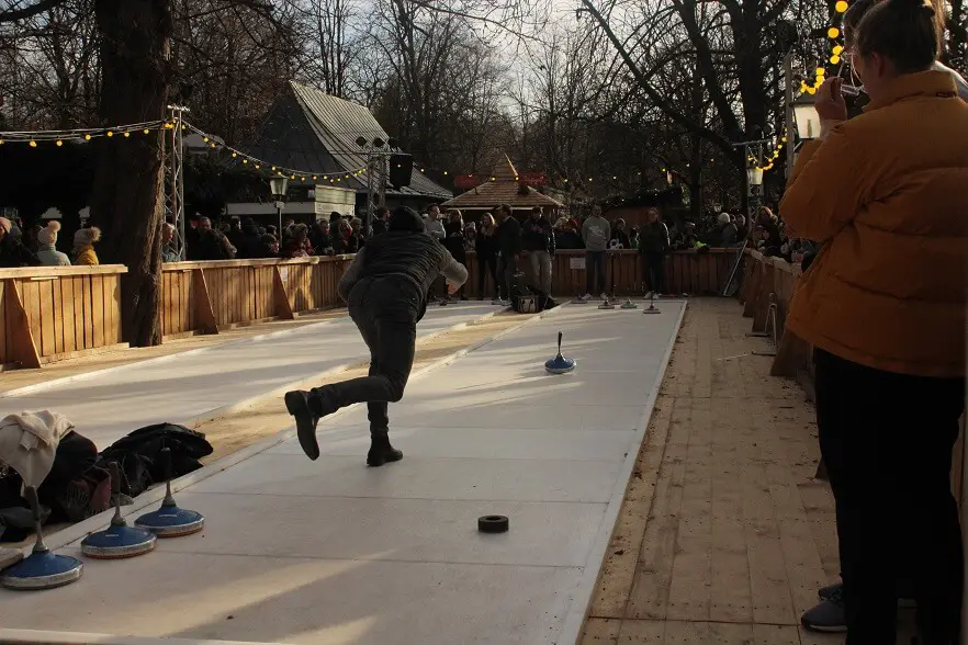 Curling game at a Christmas market in Munich, Germany