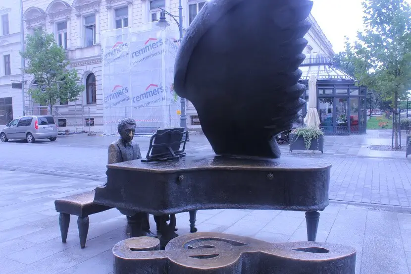 The statue of Arthur Rubinstein playing the piano on Piotrkowska street in Lodz 