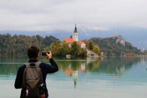 Taking photos of the church in the middle of the lake